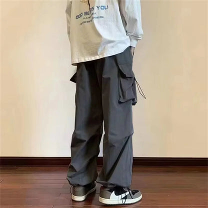 Streetwear 2024 Spring Harem Casual Pants Men Elastic Waist Solid Color Cargo Pants Multi Pocket Loose Baggy Pants For Women